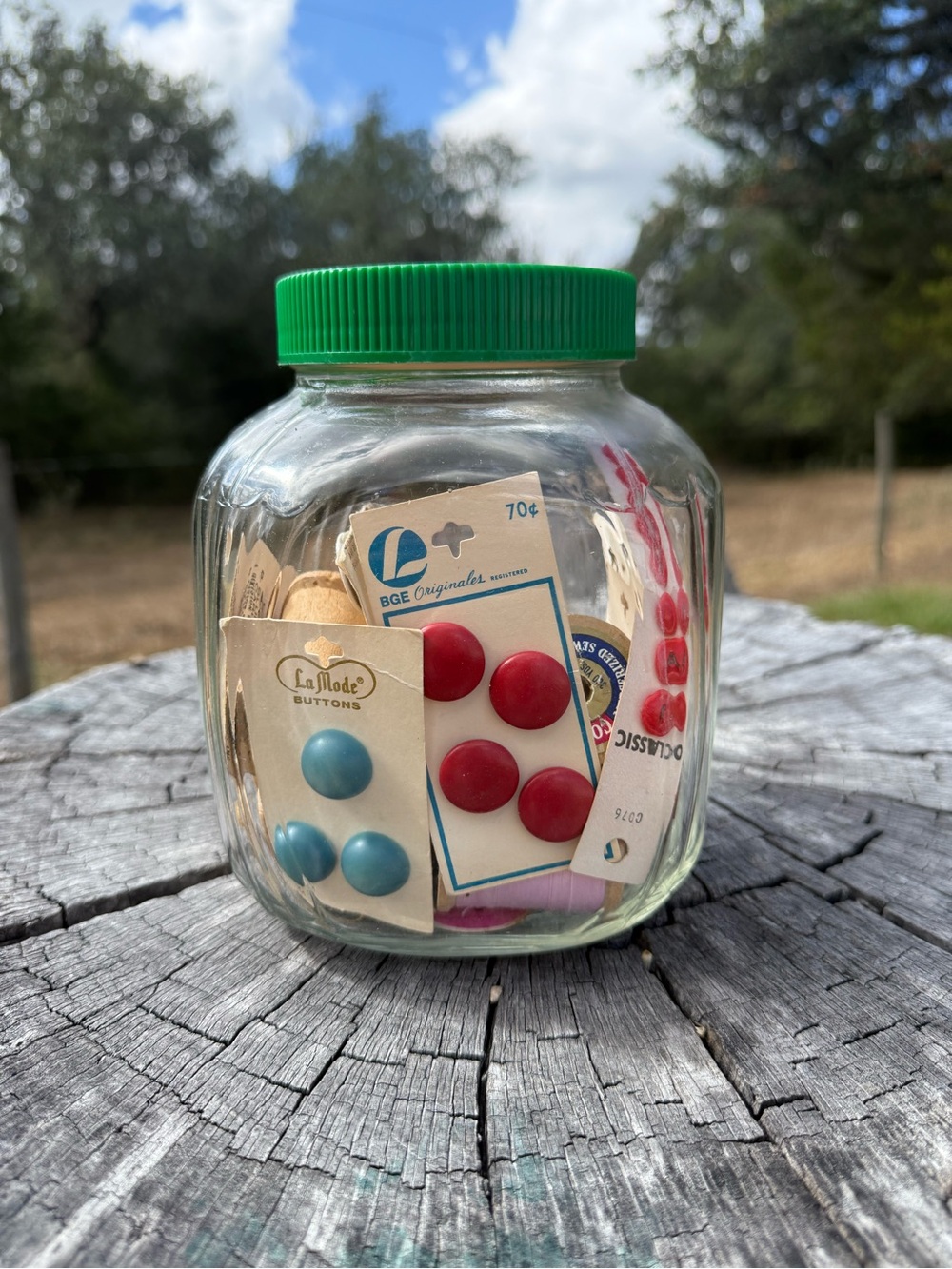 Vintage Anchor Hocking Jar filled w/vintage buttons and thread